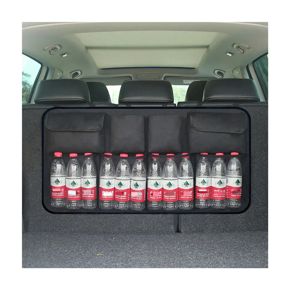 Organisateur coffre suspendu multi-poches en utilisation réelle avec des bouteilles rangée dans un coffre de voiture